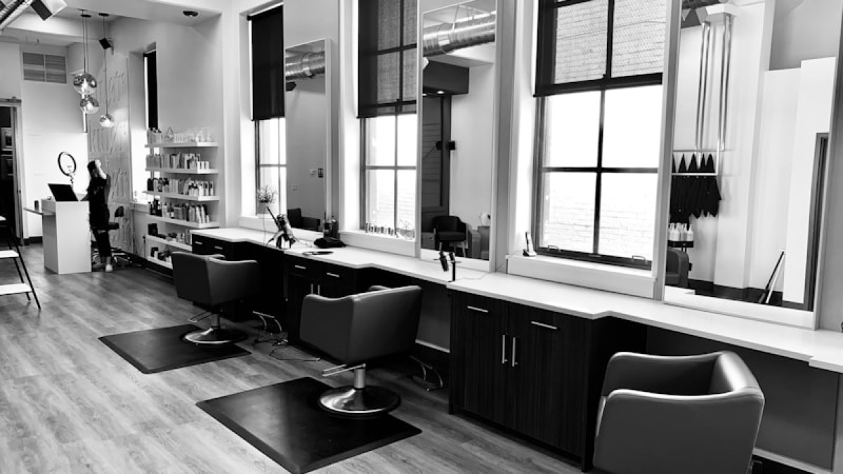 Beauty school salon training floor where students practice cosmetology services